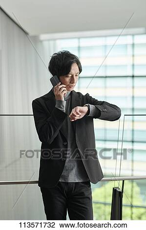 Young Japanese businessman View Large Photo Image Stock Image - Young Japanese businessman. Fotosearch