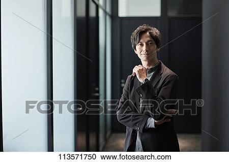 Young Japanese businessman View Large Photo Image Stock Image - Young Japanese businessman. Fotosearch