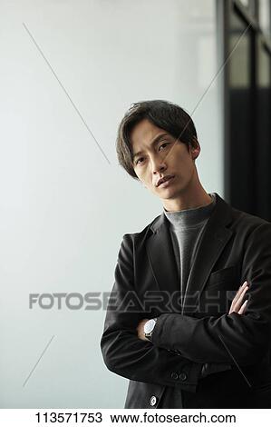 Stock Image - Young Japanese businessman. Fotosearch