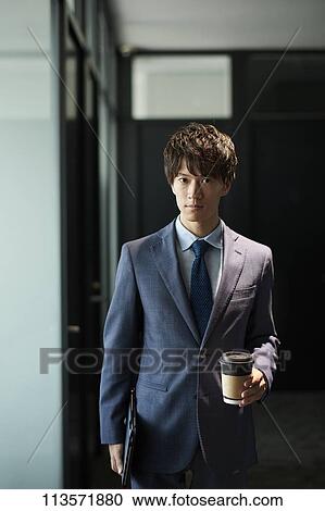 Young Japanese businessman View Large Photo Image Stock Image - Young Japanese businessman. Fotosearch
