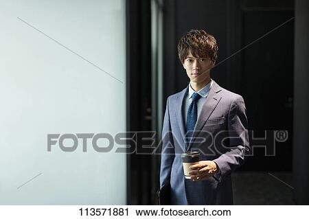 Young Japanese businessman View Large Photo Image Stock Image - Young Japanese businessman. Fotosearch