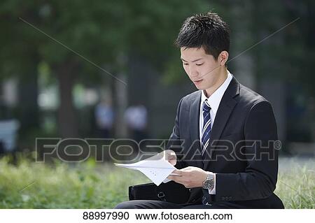 Stock Image - Young Japanese businessman. Fotosearch