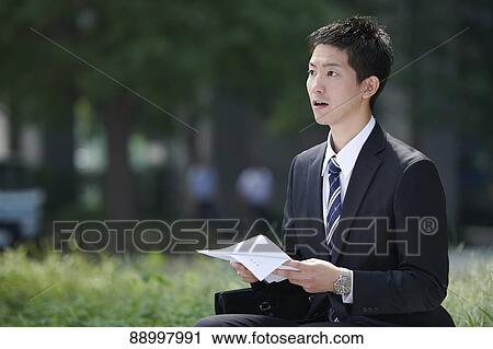 Stock Image - Young Japanese businessman. Fotosearch