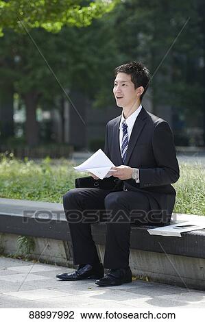 Young Japanese businessman View Large Photo Image Stock Image - Young Japanese businessman. Fotosearch