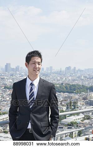 Young Japanese businessman View Large Photo Image Stock Image - Young Japanese businessman. Fotosearch