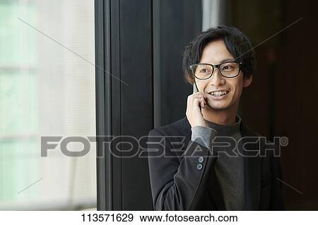 Young Japanese businessman View Large Photo Image Stock Photo - Young Japanese businessman. Fotosearch