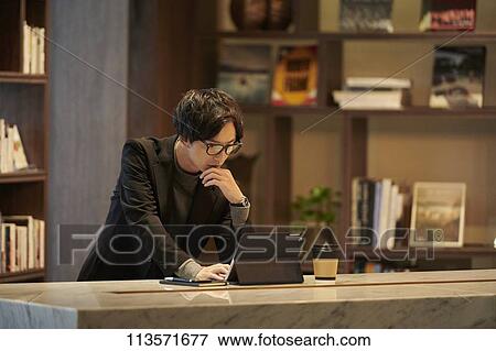 Stock Photo - Young Japanese businessman. Fotosearch