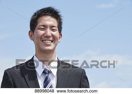 Young Japanese businessman View Large Photo Image Stock Photo - Young Japanese businessman. Fotosearch