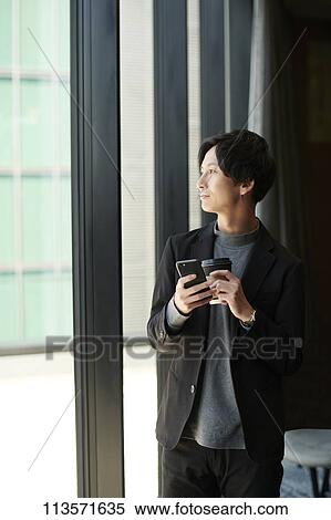 Young Japanese businessman View Large Photo Image Stock Photography - Young Japanese businessman. Fotosearch
