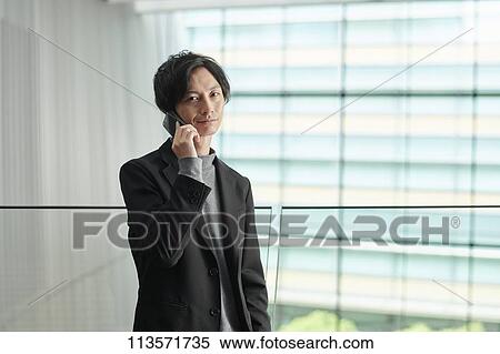 Stock Photography - Young Japanese businessman. Fotosearch