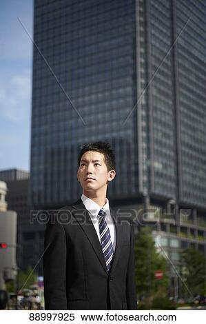 Stock Photography - Young Japanese businessman. Fotosearch
