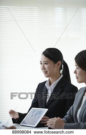 Young Japanese businesspeople View Large Photo Image Picture - Young Japanese businesspeople. Fotosearch