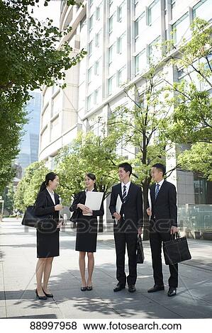 Stock Photo - Young Japanese businesspeople. Fotosearch