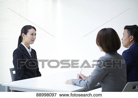 Stock Photo - Young Japanese businesspeople. Fotosearch