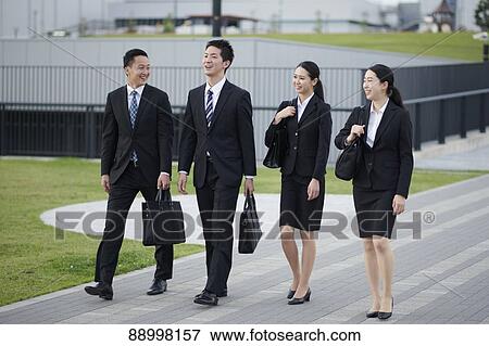 Stock Photo - Young Japanese businesspeople. Fotosearch