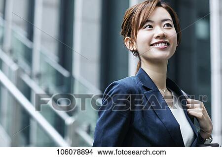 Young Japanese businesswoman downtown View Large Photo Image Picture - Young Japanese businesswoman downtown. Fotosearch