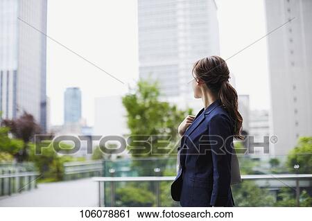Young Japanese businesswoman downtown View Large Photo Image Stock Image - Young Japanese businesswoman downtown. Fotosearch