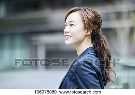 Young Japanese businesswoman downtown View Large Photo Image Stock Image - Young Japanese businesswoman downtown. Fotosearch