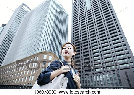 Young Japanese businesswoman downtown View Large Photo Image Stock Image - Young Japanese businesswoman downtown. Fotosearch
