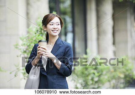 Young Japanese businesswoman downtown View Large Photo Image Stock Image - Young Japanese businesswoman downtown. Fotosearch