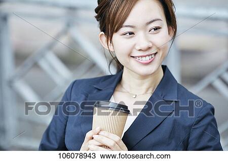 Young Japanese businesswoman downtown View Large Photo Image Stock Image - Young Japanese businesswoman downtown. Fotosearch