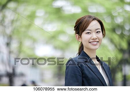 Young Japanese businesswoman downtown View Large Photo Image Stock Photography - Young Japanese businesswoman downtown. Fotosearch