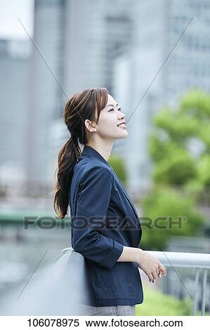 Young Japanese businesswoman downtown View Large Photo Image Stock Photography - Young Japanese businesswoman downtown. Fotosearch