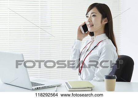 Young Japanese businesswoman View Large Photo Image Picture - Young Japanese businesswoman. Fotosearch