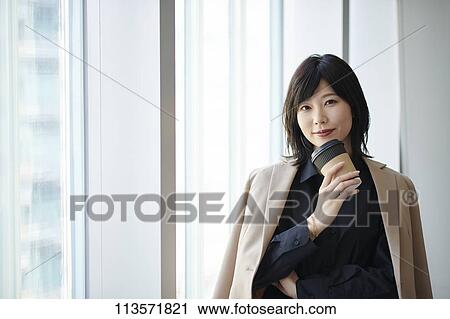 Stock Image - Young Japanese businesswoman. Fotosearch