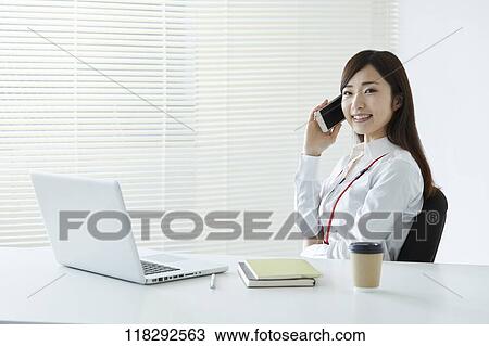 Young Japanese businesswoman View Large Photo Image Stock Image - Young Japanese businesswoman. Fotosearch