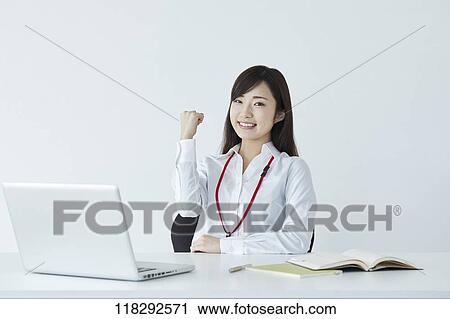 Young Japanese businesswoman View Large Photo Image Stock Image - Young Japanese businesswoman. Fotosearch