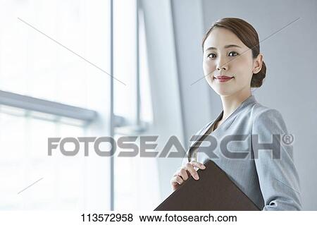 Young Japanese businesswoman View Large Photo Image Stock Photo - Young Japanese businesswoman. Fotosearch
