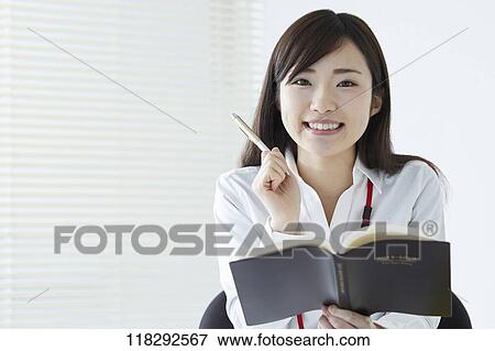 Stock Photo - Young Japanese businesswoman. Fotosearch