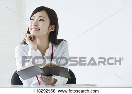 Stock Photo - Young Japanese businesswoman. Fotosearch