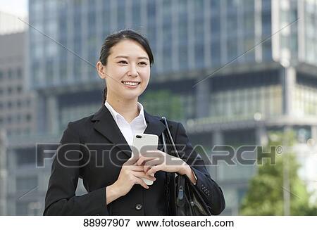 Stock Photo - Young Japanese businesswoman. Fotosearch