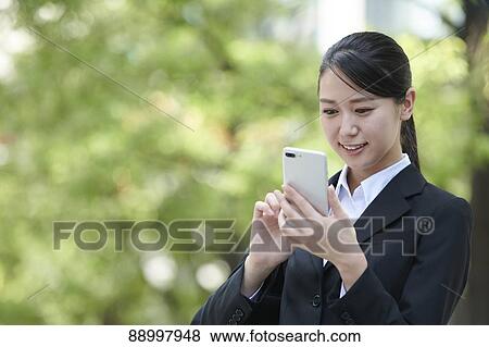 Young Japanese businesswoman View Large Photo Image Stock Photo - Young Japanese businesswoman. Fotosearch