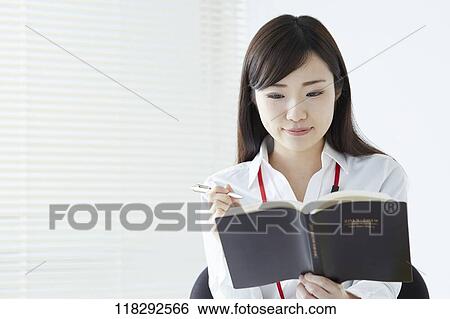 Young Japanese businesswoman View Large Photo Image Stock Photograph - Young Japanese businesswoman. Fotosearch