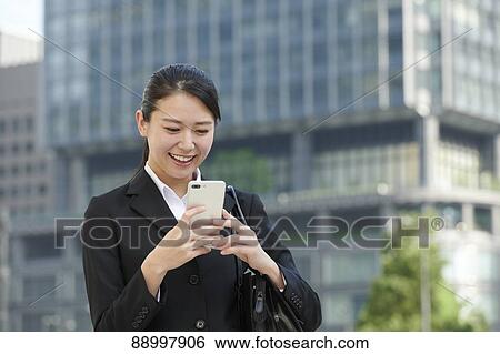 Stock Photograph - Young Japanese businesswoman. Fotosearch