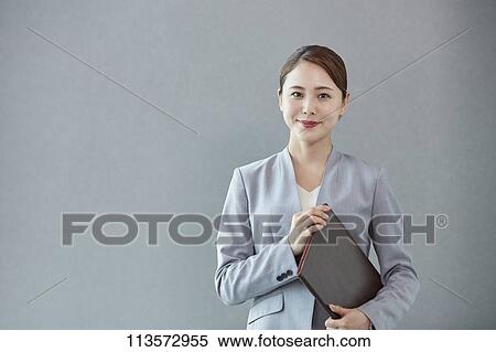 Stock Photography - Young Japanese businesswoman. Fotosearch