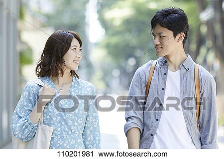 Young Japanese couple on a date View Large Photo Image Stock Image - Young Japanese couple on a date. Fotosearch