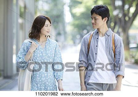 Young Japanese couple on a date View Large Photo Image Stock Image - Young Japanese couple on a date. Fotosearch
