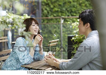 Young Japanese couple on a date View Large Photo Image Stock Photo - Young Japanese couple on a date. Fotosearch