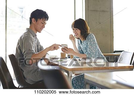 Stock Photography - Young Japanese couple on a date. Fotosearch