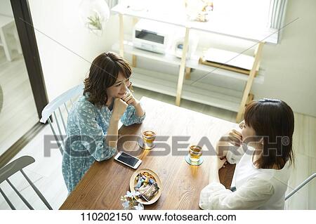 Young Japanese friends having fun together View Large Photo Image Stock Image - Young Japanese friends having fun together. Fotosearch