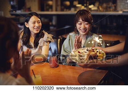 Young Japanese friends having fun together View Large Photo Image Stock Image - Young Japanese friends having fun together. Fotosearch
