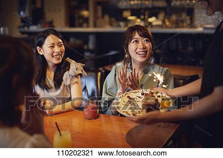 Young Japanese friends having fun together View Large Photo Image Stock Image - Young Japanese friends having fun together. Fotosearch