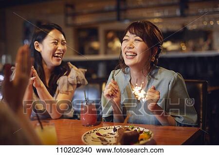 Young Japanese friends having fun together View Large Photo Image Stock Image - Young Japanese friends having fun together. Fotosearch