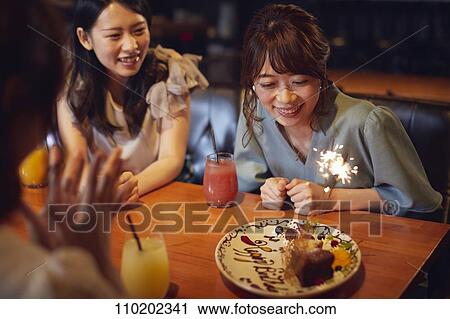 Young Japanese friends having fun together View Large Photo Image Stock Image - Young Japanese friends having fun together. Fotosearch