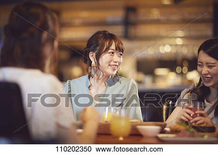 Young Japanese friends having fun together View Large Photo Image Stock Image - Young Japanese friends having fun together. Fotosearch