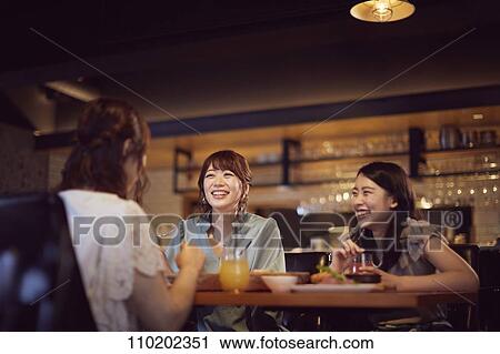 Young Japanese friends having fun together View Large Photo Image Stock Image - Young Japanese friends having fun together. Fotosearch